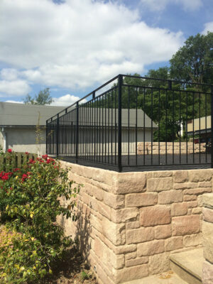 A neat, crisp angular black metal railing we created from scratch (by Derbyshire Dales Engineering)