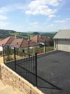 A neat, crisp angular black metal railing we created from scratch (by Derbyshire Dales Engineering)