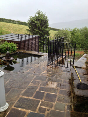 Safety hand-rails on a raised patio area (by Derbyshire Dales Engineering)