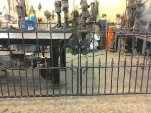 Working on a bespoke pair of gates for a customer's drive