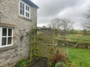 Wooden framework and side-gate to be replaced by our custom metal railings (exterior)